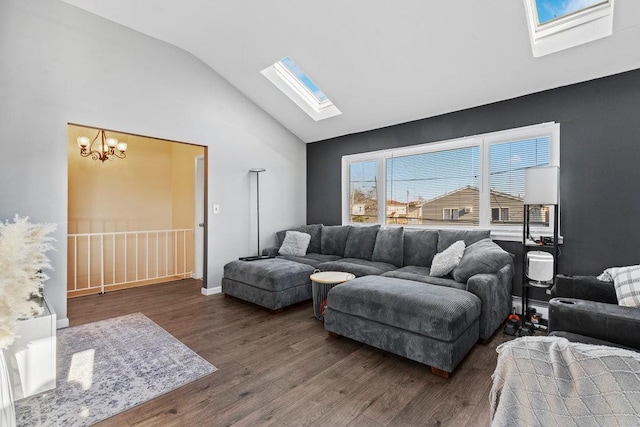 living room featuring baseboard heating, vaulted ceiling with skylight, dark wood-type flooring, and an inviting chandelier