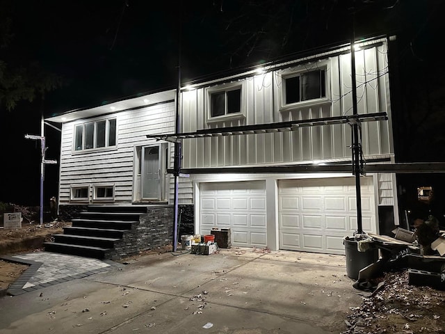 view of front of home with a garage