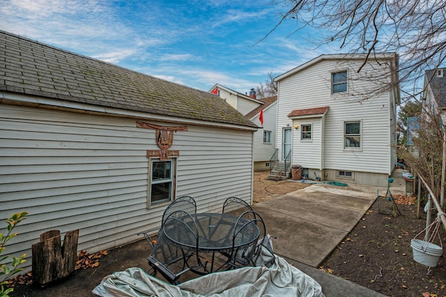 back of house with a patio area