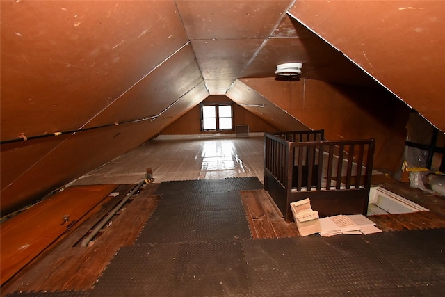 bonus room featuring lofted ceiling