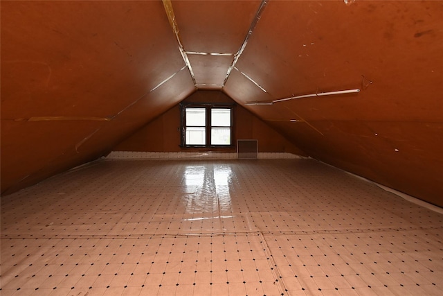 bonus room with vaulted ceiling