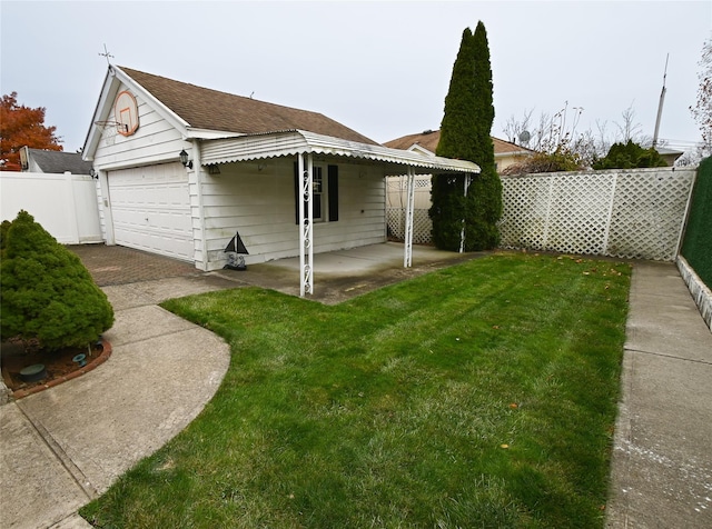 exterior space with a patio and a garage