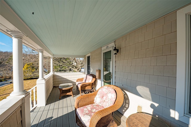 wooden terrace with covered porch