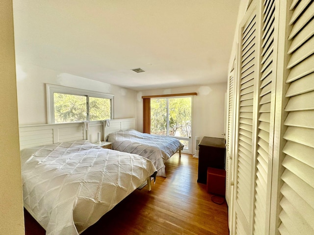 bedroom featuring hardwood / wood-style flooring