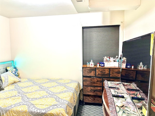 bedroom featuring carpet flooring