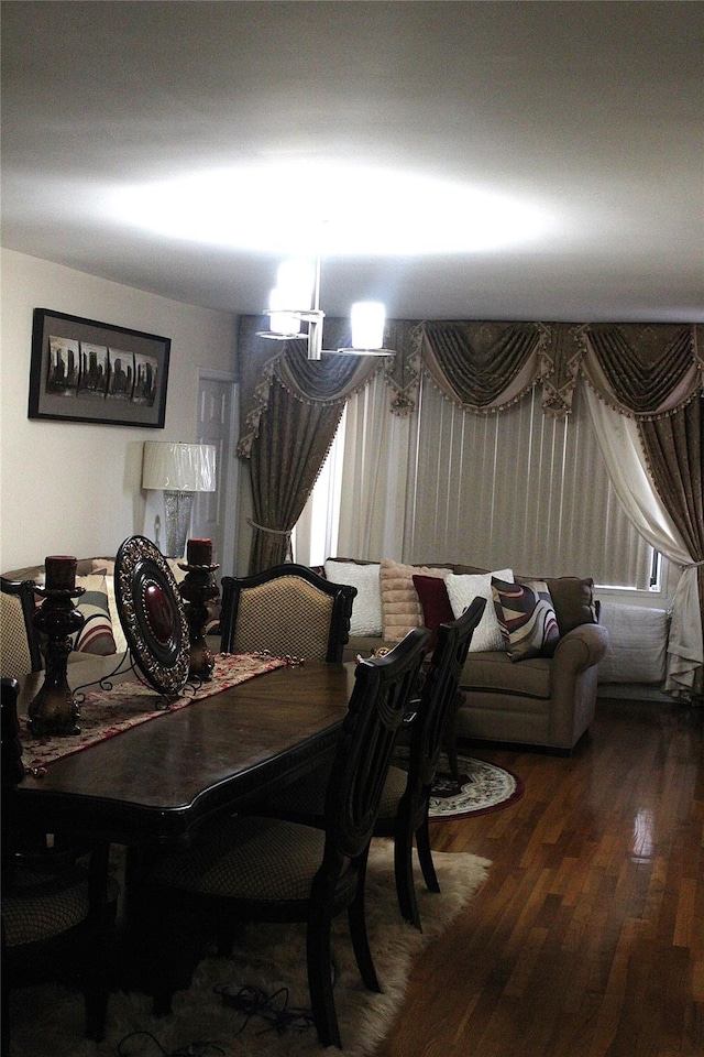 dining area featuring dark hardwood / wood-style flooring