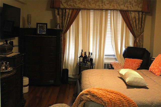 bedroom featuring dark wood-type flooring