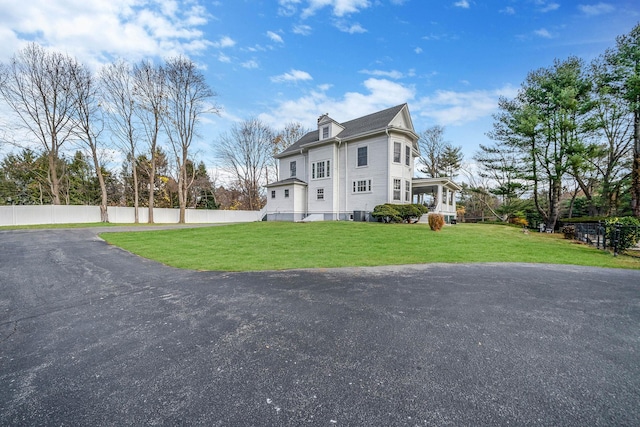 view of front of home with a front lawn