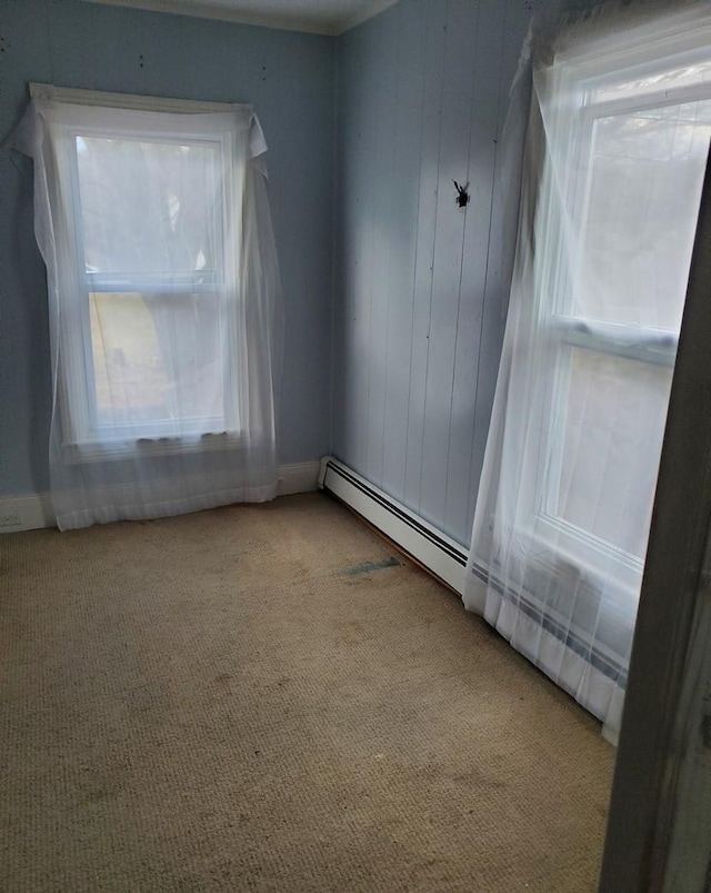 empty room with plenty of natural light and light carpet