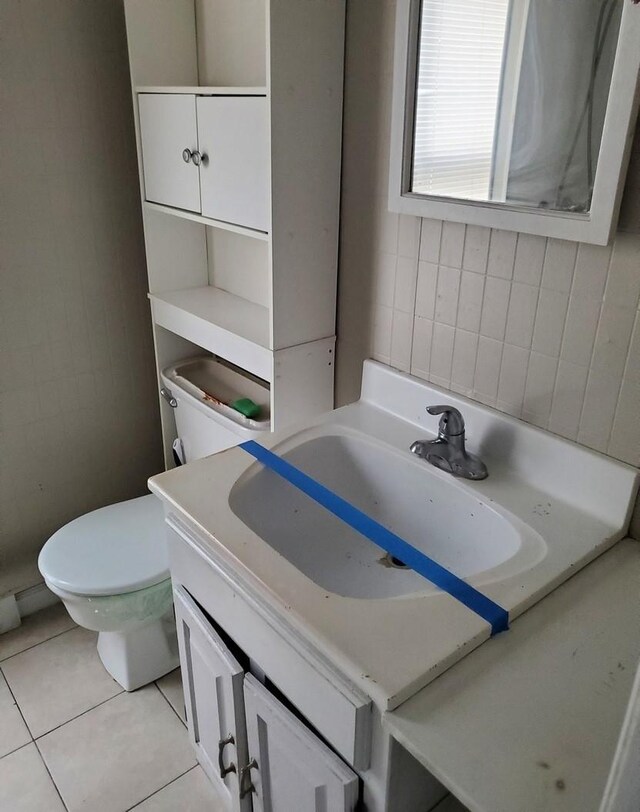 9 Hermance St, Ellenville, NY 12428 - bathroom featuring vanity and tile patterned flooring