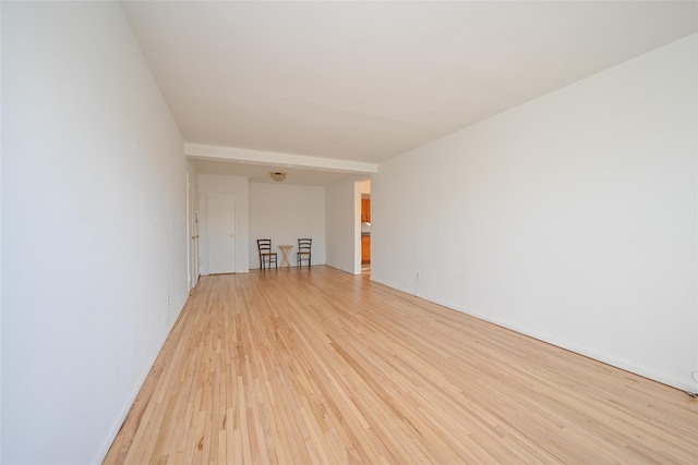 unfurnished room featuring light hardwood / wood-style flooring