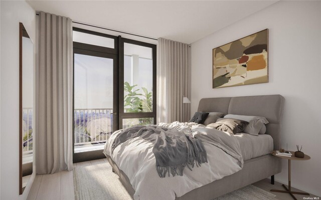 bedroom featuring multiple windows and floor to ceiling windows