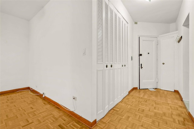 corridor featuring light parquet floors