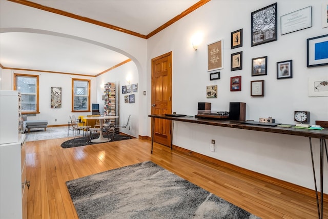 interior space featuring hardwood / wood-style floors and ornamental molding