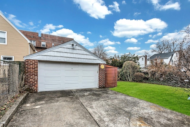 garage with a yard