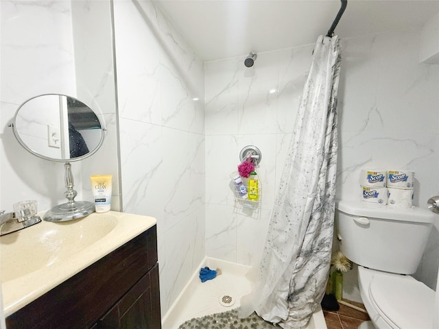 bathroom with a shower with shower curtain, vanity, toilet, and tile patterned flooring