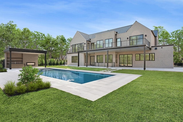 view of swimming pool with a patio area and a lawn