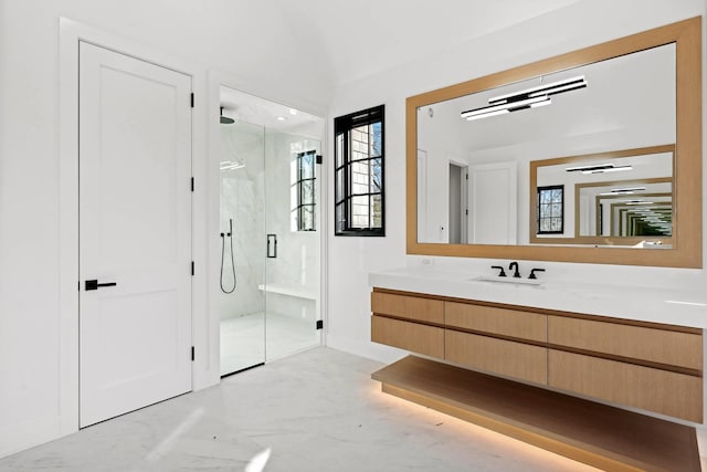 bathroom with vanity and an enclosed shower