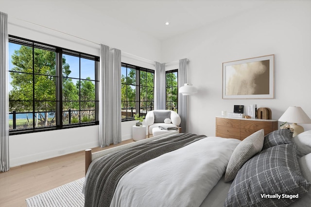 bedroom featuring light hardwood / wood-style floors