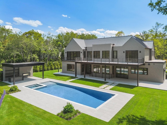 5 Widow Coopers Path, Sag Harbor, NY 11963 - rear view of house featuring a patio, a balcony, a lawn, and a pool with connected hot tub