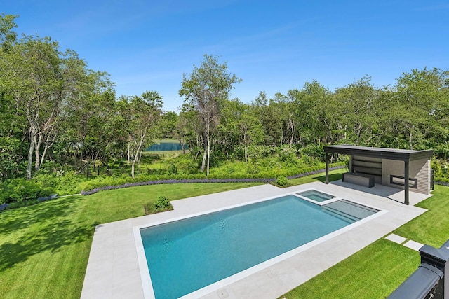 5 Widow Coopers Path, Sag Harbor, NY 11963 - view of pool featuring a lawn, a water view, and a pool with connected hot tub