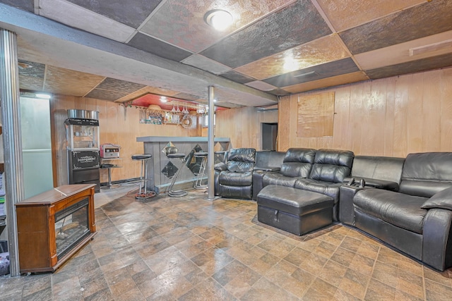 home theater room featuring wooden walls