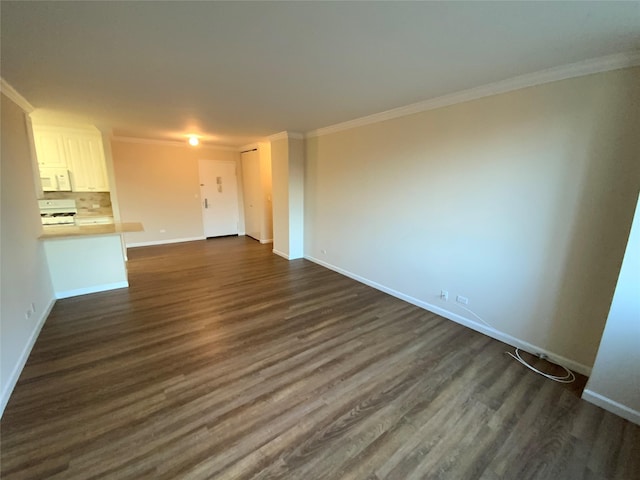 unfurnished living room with ornamental molding and dark wood-type flooring