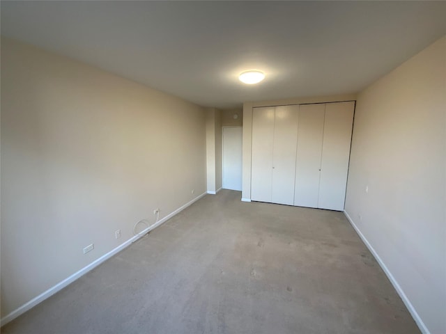 unfurnished bedroom featuring a closet