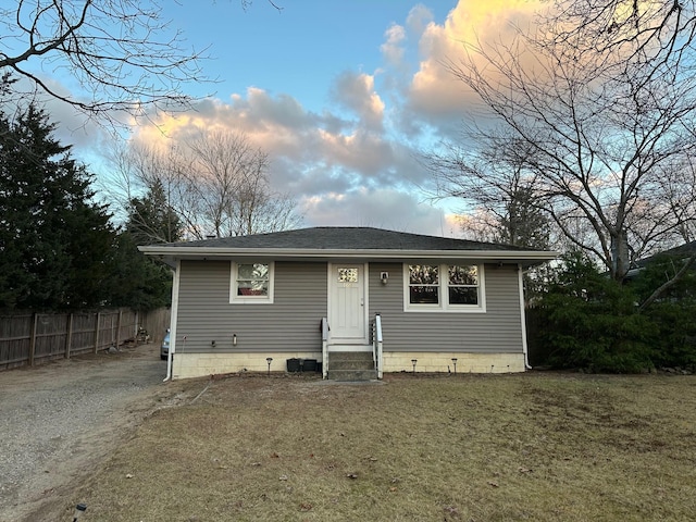 view of front of house with a lawn