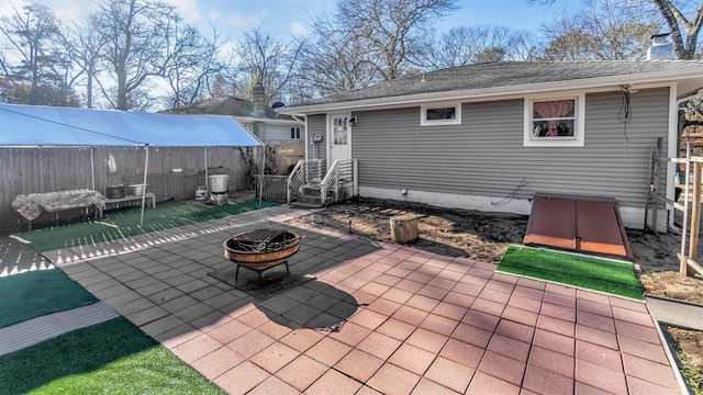 view of patio featuring an outdoor fire pit