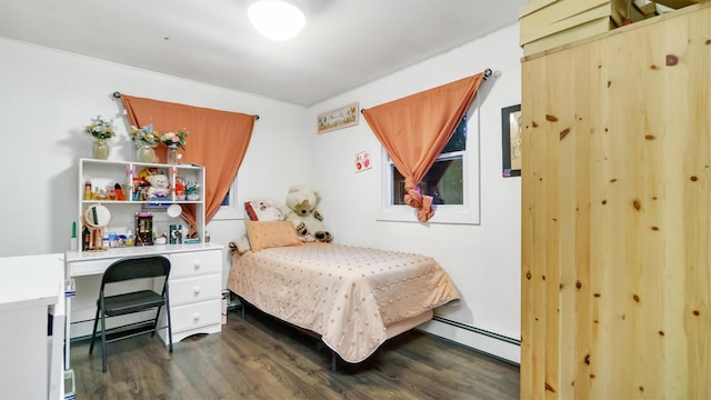 bedroom featuring a baseboard radiator and dark wood-type flooring