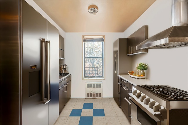 kitchen with stainless steel appliances and extractor fan