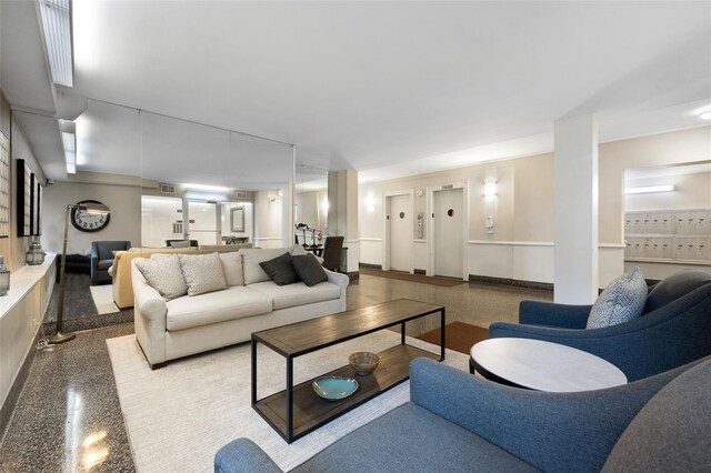 living room featuring granite finish floor