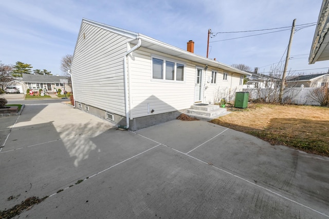 rear view of property featuring a patio