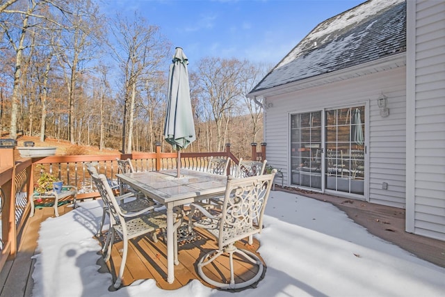 view of snow covered deck