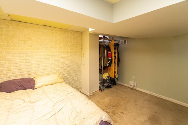 carpeted bedroom with a closet