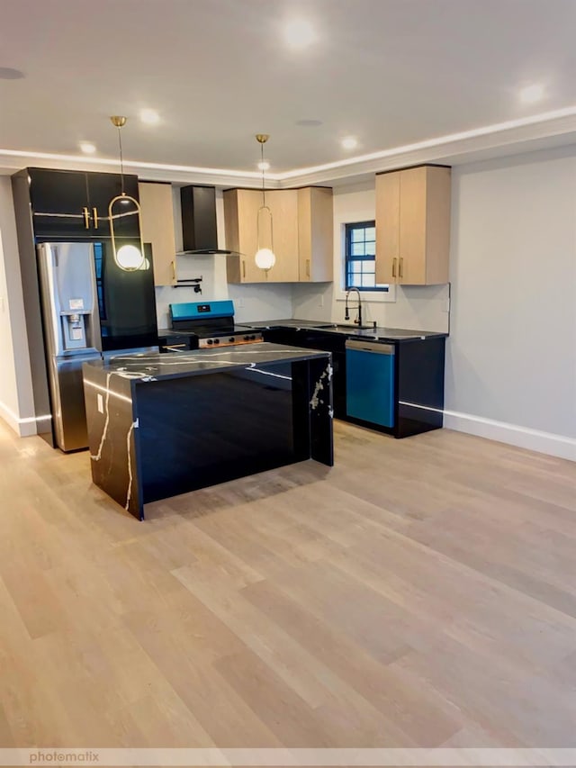 kitchen featuring pendant lighting, a kitchen island, black appliances, and light brown cabinetry