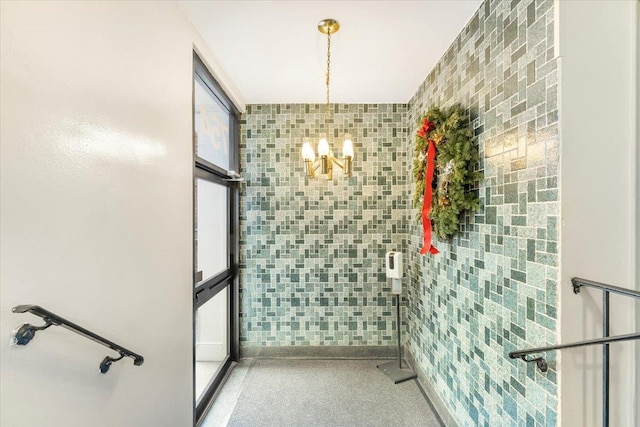 interior space featuring tile walls