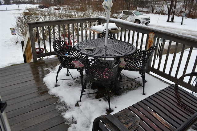 view of snow covered deck