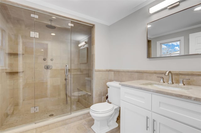 bathroom with crown molding, a shower with door, tile walls, and toilet