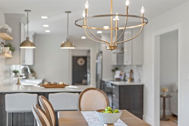 dining room featuring a chandelier