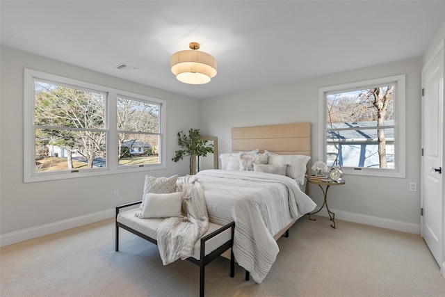 bedroom with light carpet