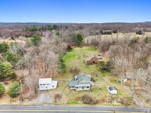 birds eye view of property featuring a rural view