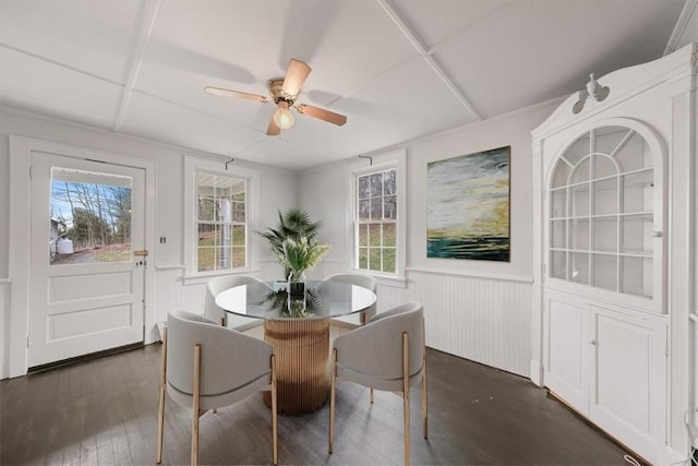 dining room featuring dark hardwood / wood-style flooring and ceiling fan