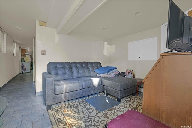 living room with beamed ceiling