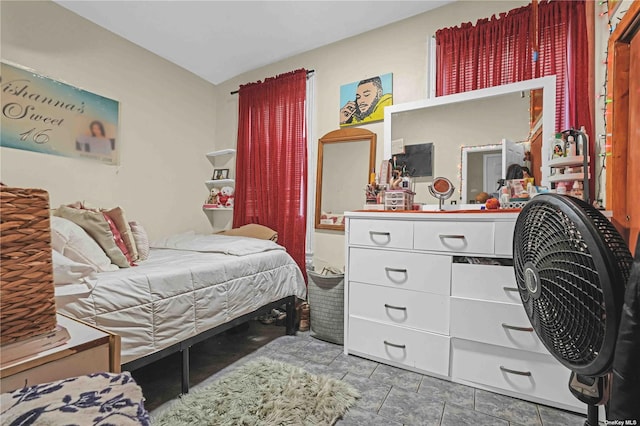 bedroom with light tile patterned floors