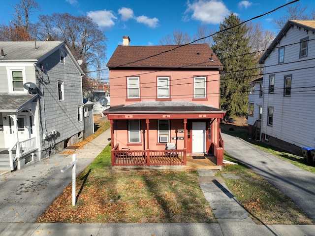 front facade featuring covered porch