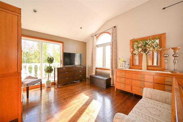 sitting room featuring dark hardwood / wood-style flooring and vaulted ceiling