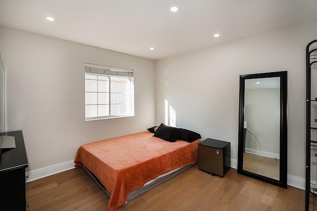 bedroom featuring hardwood / wood-style flooring