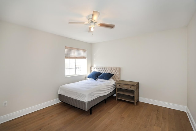 bedroom with wood-type flooring and ceiling fan